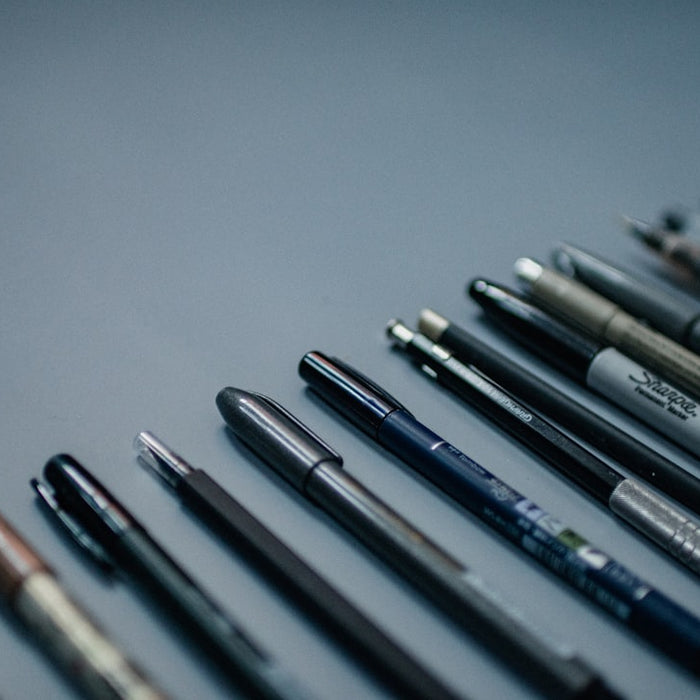 blue and silver click pen