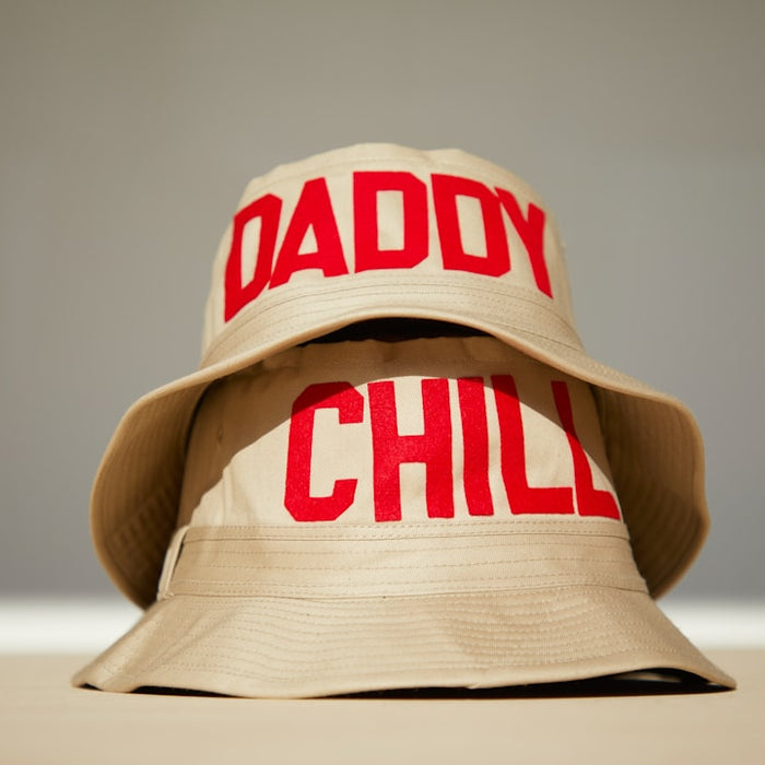 a hat with the words daddy and chill printed on it