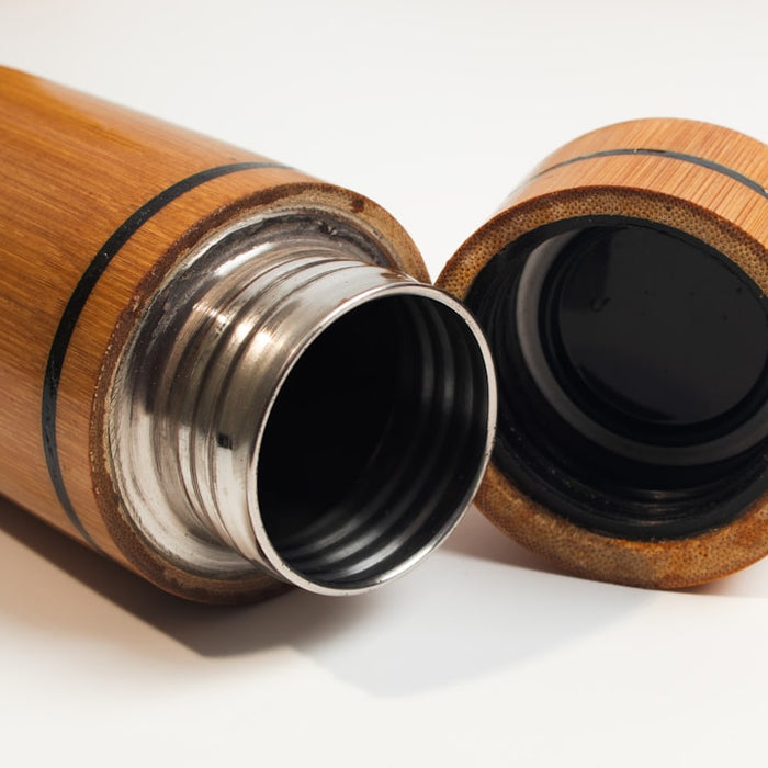 a close up of a metal and wood object