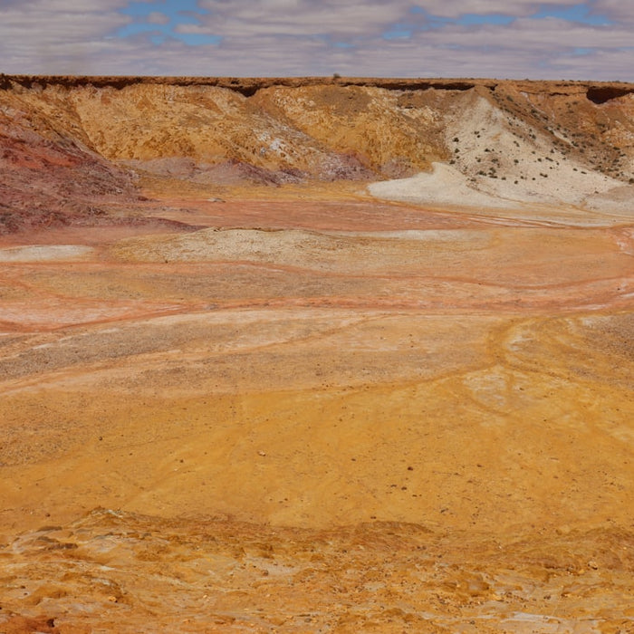 a view of a barren area with a sky background