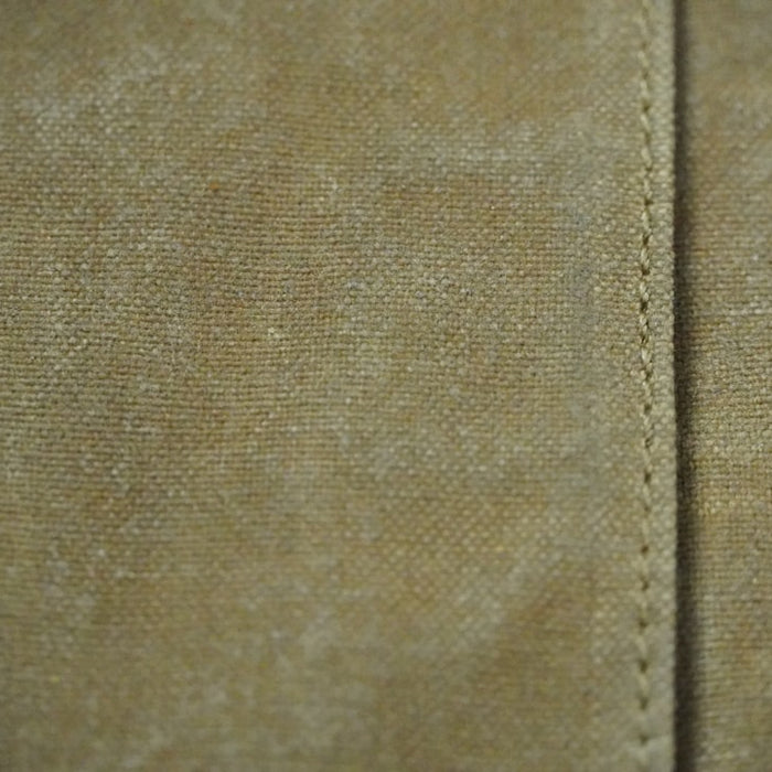 a close up of a tan colored fabric