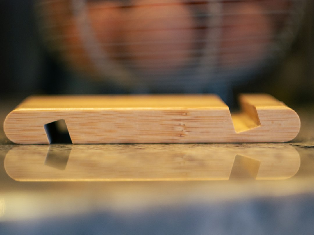 a close up of a wooden object on a table