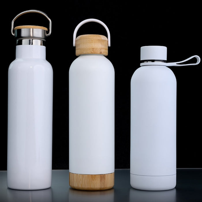 Three white water bottles are displayed.