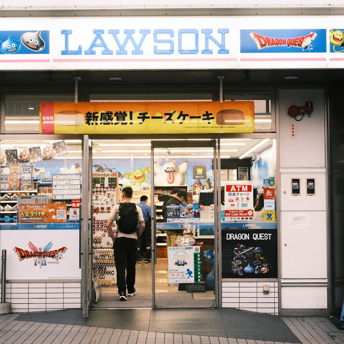 A person enters a lawson convenience store in japan.