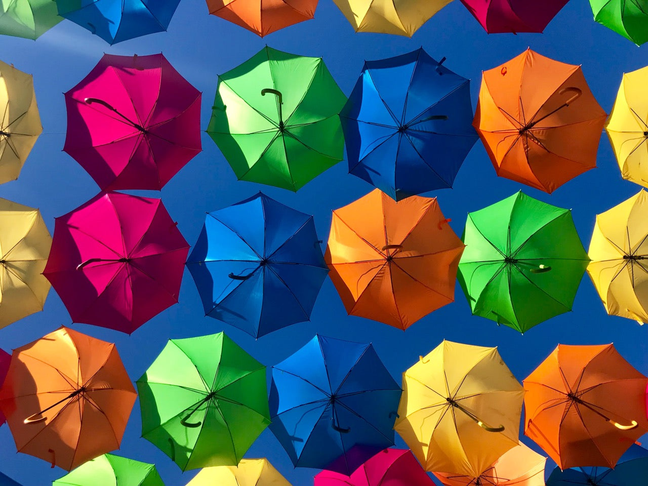 Making a Statement: The Unparalleled Advantages of Promotional Custom Umbrellas for Corporate Merchandising
