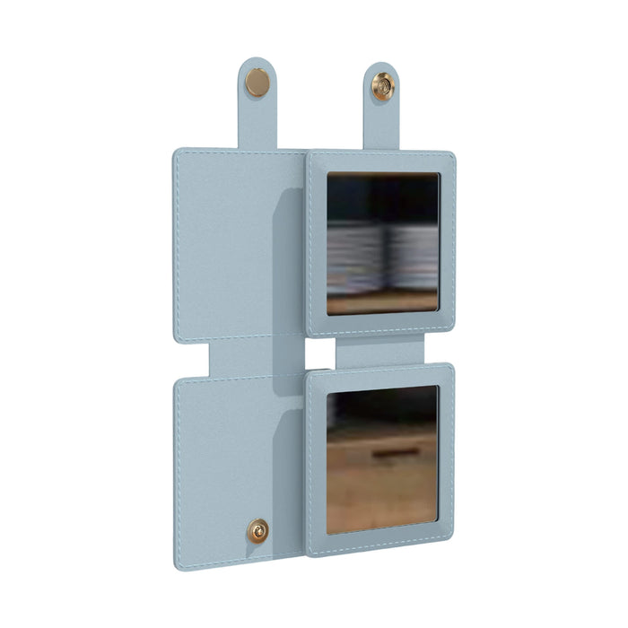 Suqare Folding Pocket Mirror - A square folding pocket mirror in light blue with two reflective surfaces and a snap closure.