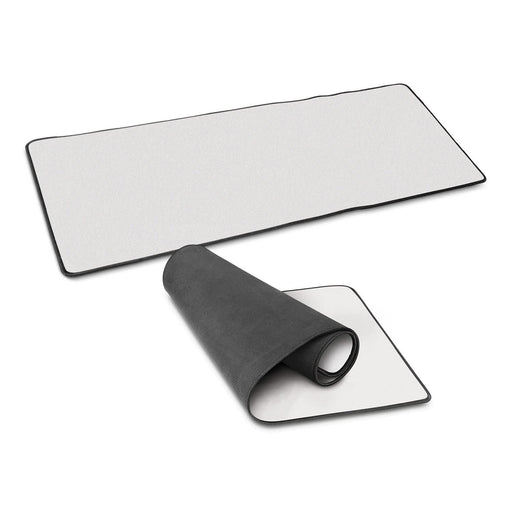 Jumbo Desk Mat - A Jumbo Desk Mat in white with a black border, displayed flat and rolled up partially to show both sides.