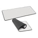 Jumbo Desk Mat - A Jumbo Desk Mat in white with a black border, displayed flat and rolled up partially to show both sides.
