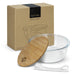 NATURA Iris Glass Food Container - A glass food container with a bamboo lid, accompanied by a white silicone band and packaged in a cardboard box.