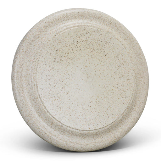 Choice Flyer - Large - A large, speckled beige plate with a smooth surface and a raised edge, featuring a subtle logo.