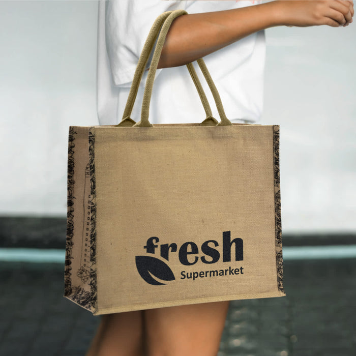 Modena Jute Tote Bag - A jute tote bag in natural brown with dark patterned sides and a logo on one side.