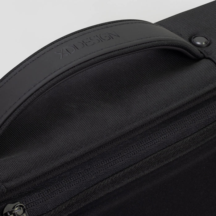 Bobby Bizz Anti-theft Backpack  Briefcase - A black anti-theft backpack briefcase with a textured handle and a branding logo on the top.