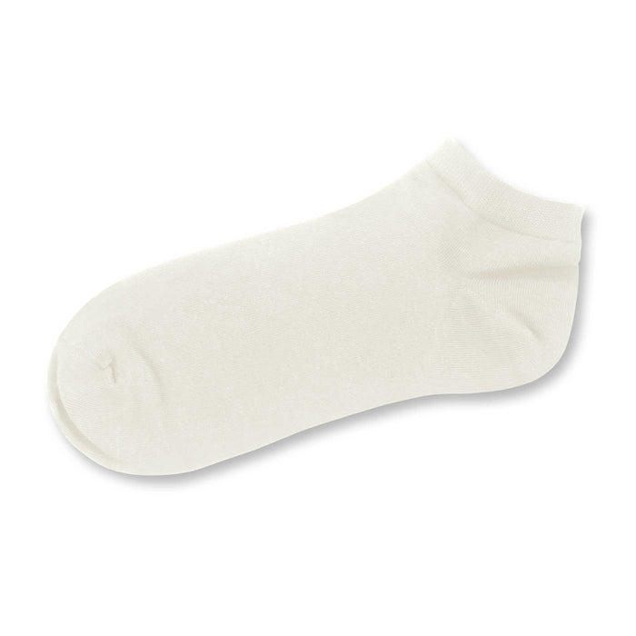 June Ankle Socks - A pair of cream-coloured ankle socks, featuring a smooth texture and a simple design.