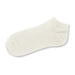 June Ankle Socks - A pair of cream-coloured ankle socks, featuring a smooth texture and a simple design.
