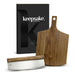 Keepsake Pizza Set - A wooden cheese board and knife set, featuring a stainless steel blade, packaged in a sleek black box with a logo.