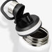 Solana Bottle - A drink bottle in white with a black lid and an opening ready for use. It features a handle and a logo.