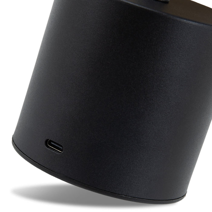 Nouveau Rechargeable Table Lamp - A black rechargeable table lamp with a USB-C charging port at the base, featuring a sleek cylindrical design.