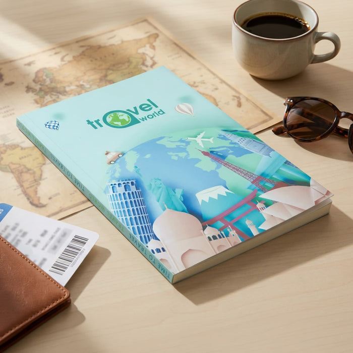 Verse Notebook - A teal notebook featuring travel-themed illustrations, placed on a wooden surface alongside a coffee cup and sunglasses.