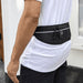Varyon GRS Recycled Running Waist Pack - A black recycled running waist pack with a textured finish, featuring drawstrings and a logo, worn at the waist.