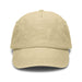 Vintage Washed Cap - A vintage washed cap in a light beige colour with a curved brim and a logo.
