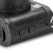 Candid Mini Camera - A compact black mini camera featuring textured detailing and control buttons on the side.