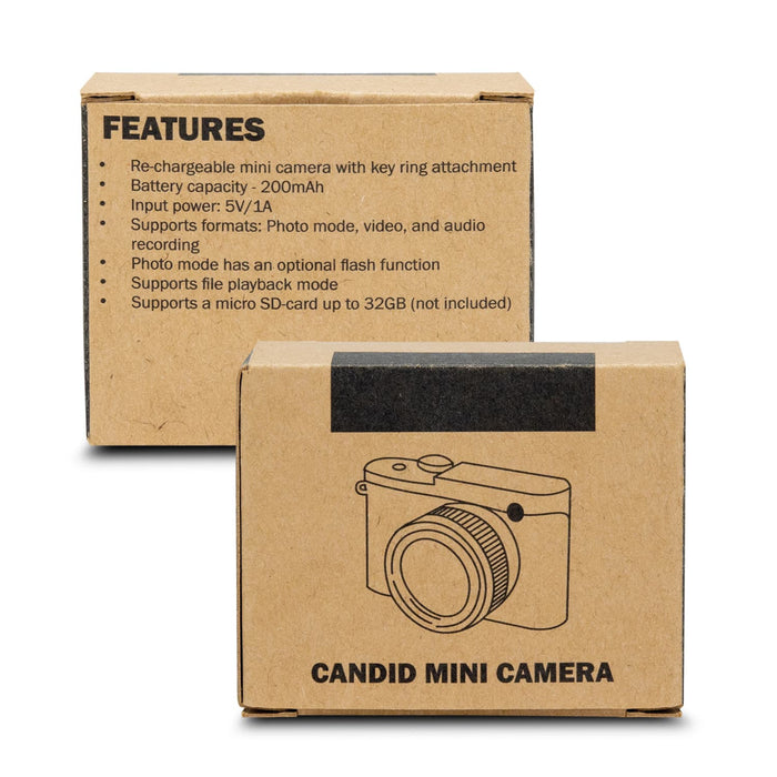 Candid Mini Camera - A brown cardboard box containing a Candid Mini Camera with a key ring attachment. It features a camera graphic on the front.