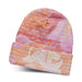 Everest Custom Full Colour Beanie - A full-colour beanie in pink and orange hues with a swirled pattern and a cuffed design. It has a logo.
