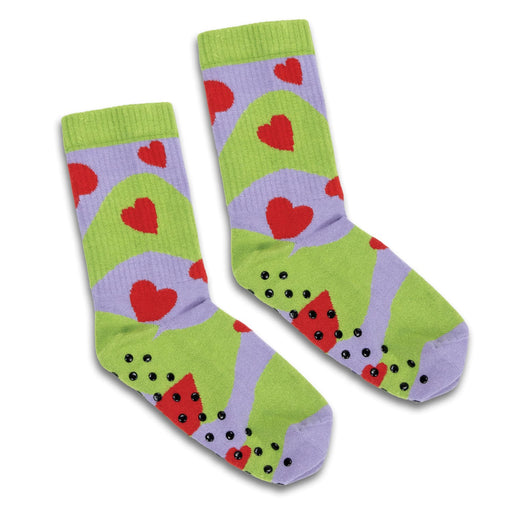Pixel Knitted Bamboo Grip Socks - Bright green and lavender socks featuring red hearts and black non-slip grips on the soles, with a playful design.