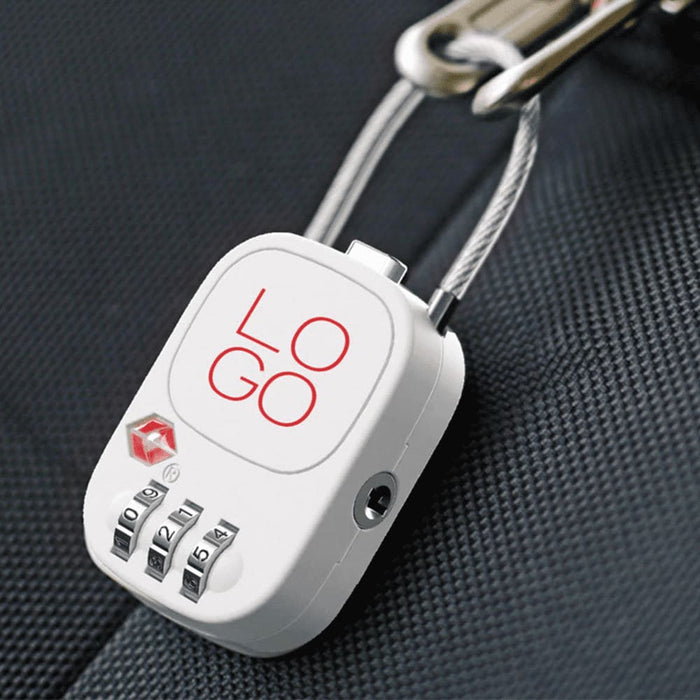 Atlas TSA Lock - A white TSA lock with a combination dial attached to a travel bag, featuring a logo on the front.