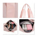 Bucket Duffle Bag With Wide Straps - A pink bucket duffle bag featuring wide straps and multiple compartments, with various items neatly arranged inside.