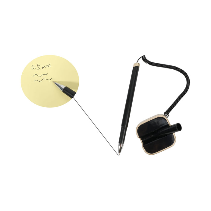 Counter Fixed Signature Pen E - A black signature pen with a spring chain, positioned next to a yellow notepad featuring handwritten notes.