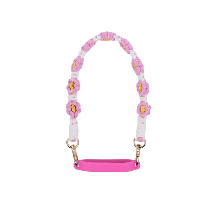 Woven Flower Tumbler Strap - A drink bottle strap featuring woven pink and white flowers with yellow centres, complemented by a pink silicone grip.