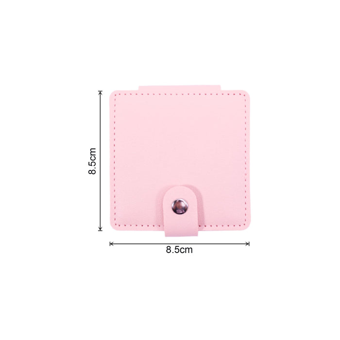 Suqare Folding Pocket Mirror - A pink square folding pocket mirror with a snap closure, featuring dimensions of 8.5 cm by 8.5 cm.