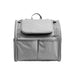 Pet Backpack Carrier with Expandable Design - A grey pet backpack carrier featuring an expandable design and multiple storage pockets. It has a handle and straps.