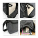 Convertible Lightweight Backpack Duffel Bag - A black and grey checkered convertible backpack duffel bag with a phone, notebook, and drink bottle inside.