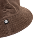 Atlanta Cord Bucket Hat - A brown corduroy bucket hat with a logo tag on the side. The texture is clearly visible in the image.