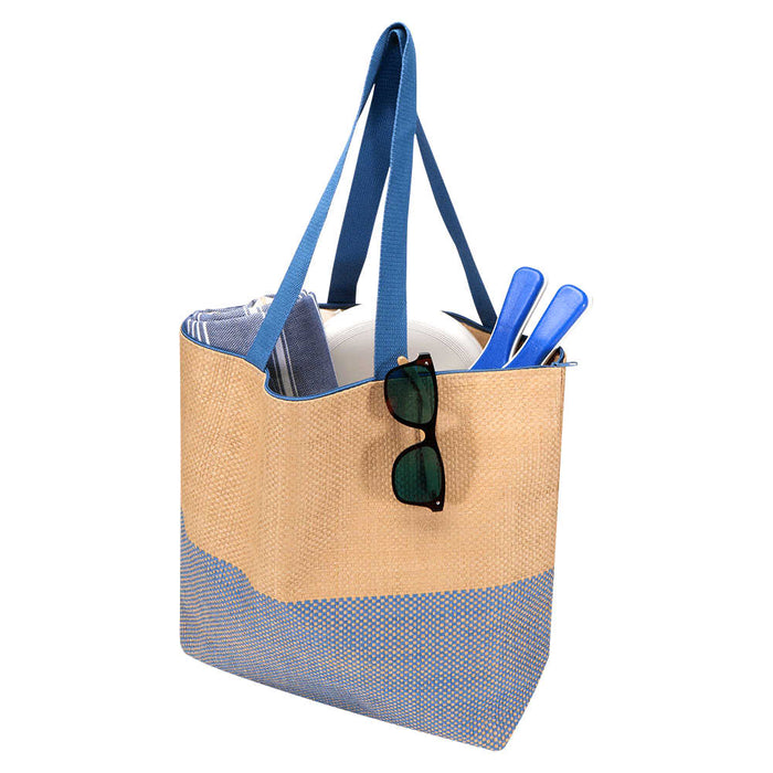 Paper Straw Large Zipped Tote - 21L - A large zipped tote bag in beige and blue, featuring sunglasses, a towel, and utensils inside.