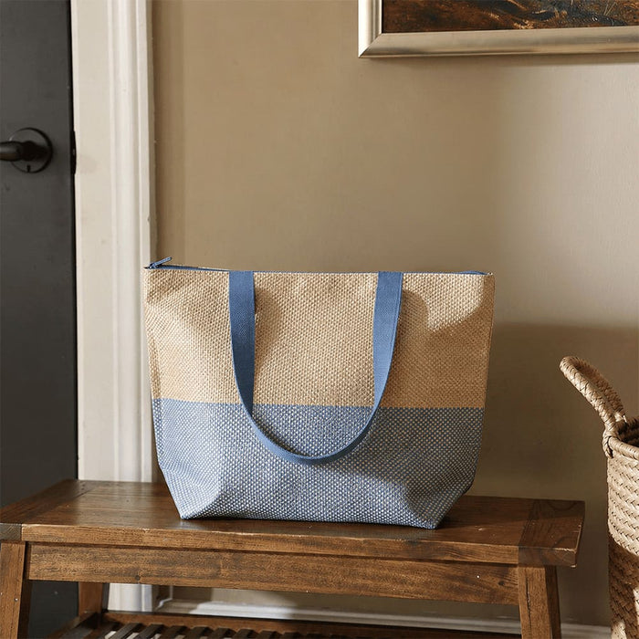 Paper Straw Large Zipped Tote - 21L - A large zipped tote bag in a natural and blue colour scheme, featuring sturdy handles and a spacious design.