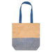 Paper Straw Tote Bag - 10L - A tote bag with a natural tan upper and blue patterned lower section, featuring two blue handles and a logo.
