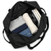 Rime Duffel Bag - A black duffel bag with neatly packed clothing, headphones, and a book, showcasing its spacious interior.