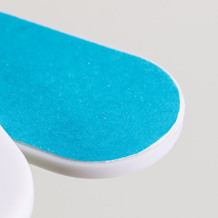 Foldable Nail File Block - A foldable nail file block featuring a turquoise surface and a white base.