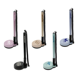Counter Fixed Signature Pen D - A set of five fixed signature pens on stands, featuring pastel colours like pink, beige, and blue, with various branding.