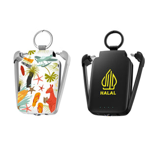Mini Power Bank with Flashlight - A mini power bank with a flashlight, featuring a colourful tropical design on one side and a black side with a logo.