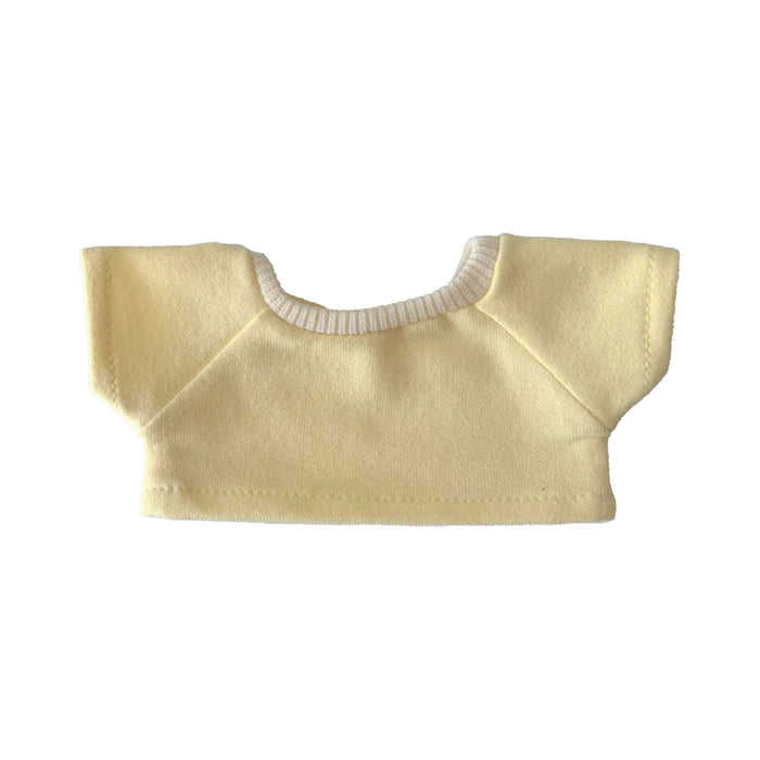 Plush Doll Basic T-Shirt - A yellow plush doll basic T-shirt with a ribbed neck, featuring short sleeves. There is a logo on the garment.