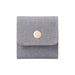 Mini Synthetic Leather Jewellery Bag - A grey synthetic leather jewellery bag with a gold button closure and stitched detailing.