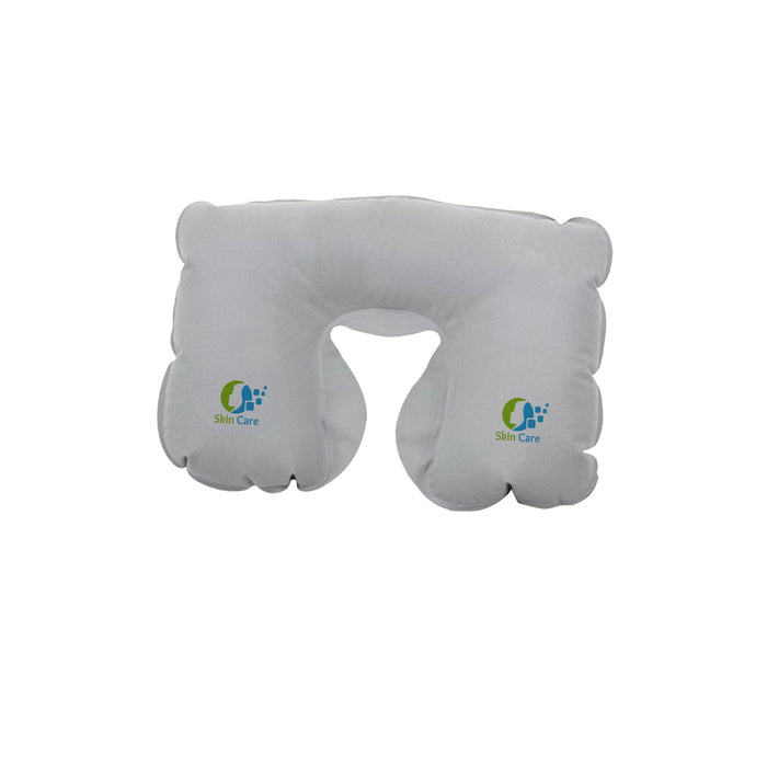 Inflatable travel Pillow - An inflatable travel pillow in white, featuring rounded edges and a logo on one side.