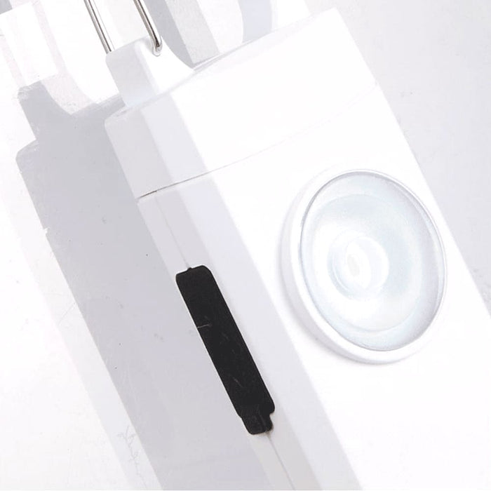 Safety Alarm Keychain - A white safety alarm keychain with a circular button and a small black switch. It has a branding logo.