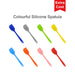4-Section Dog Enrichment Lick Mat - A colourful silicone spatula set featuring eight spatulas in grey, green, blue, yellow, orange, and pink. Has a logo.