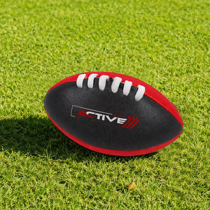 Mini Aussie Rules Ball - A Mini Aussie Rules Ball in black with red accents, featuring white laces and a logo.