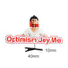 Custom Felt Spring Hair Clip - A colourful promotional clip featuring a character with red hair and a white outfit, labelled "Optimism Joy Me".